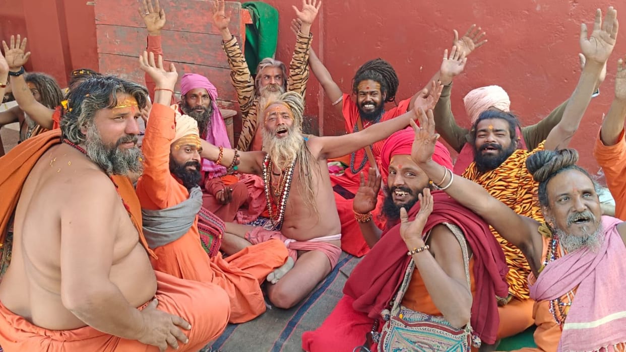 procession of sadhus and sanyasis in Photo flowers showered on way