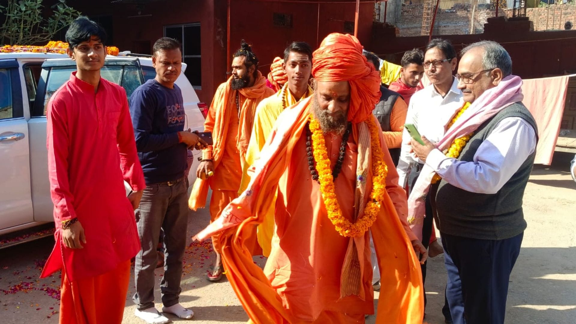 procession of sadhus and sanyasis in Photo flowers showered on way