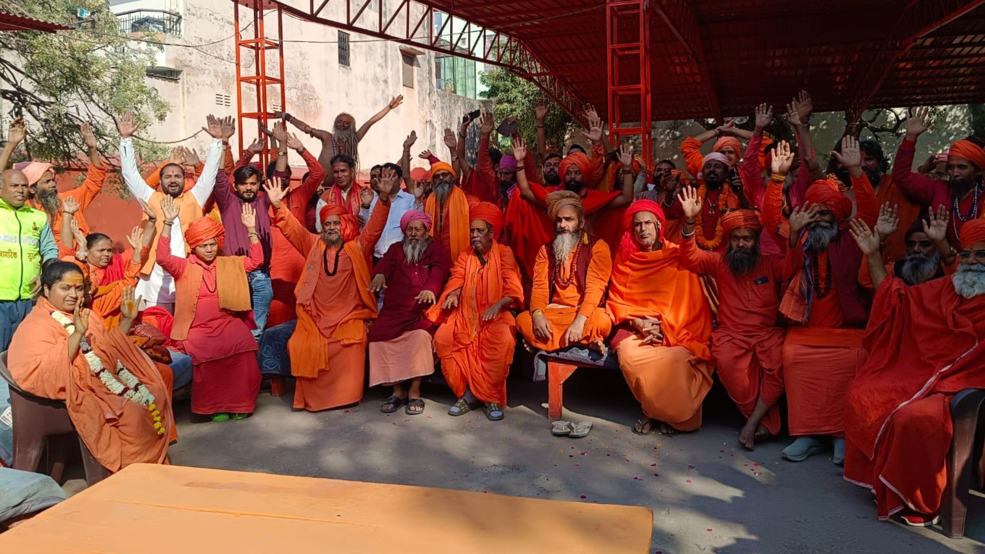 procession of sadhus and sanyasis in Photo flowers showered on way