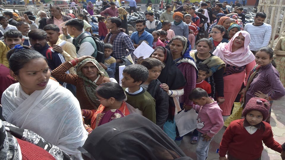 Battle for Aadhar Card Staying in line for hours pushing and shoving and fighting due to crowd