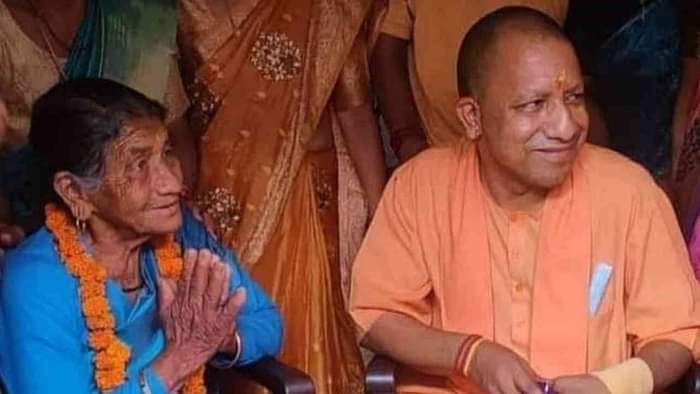 CM Yogi Adityanath Uttarakhand Visit sisters bid farewell to CM Yogi by feeding him curd and sugar