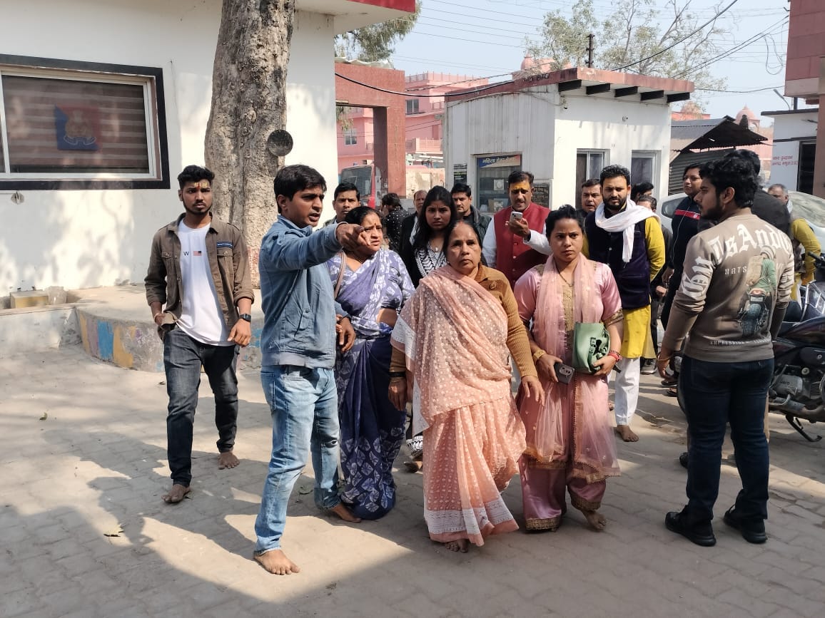 Beating of devotees in Bankebihari temple