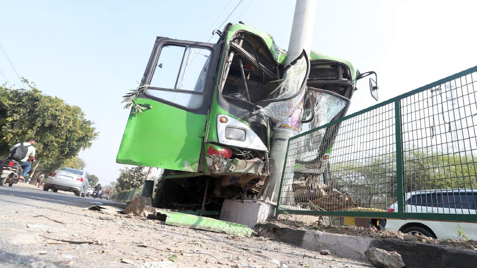 DTC Bus went out of control and climbed onto divider then hit a pillar