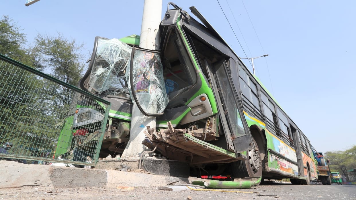 DTC Bus went out of control and climbed onto divider then hit a pillar