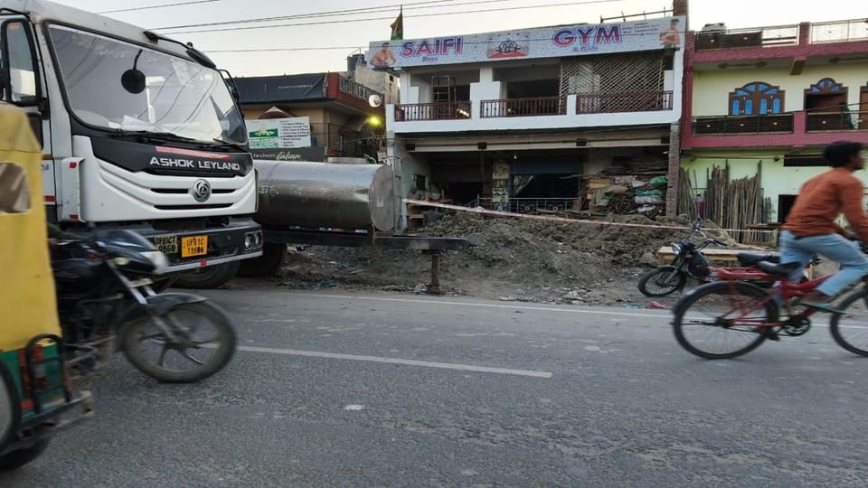 dug a drain, put soil on the road