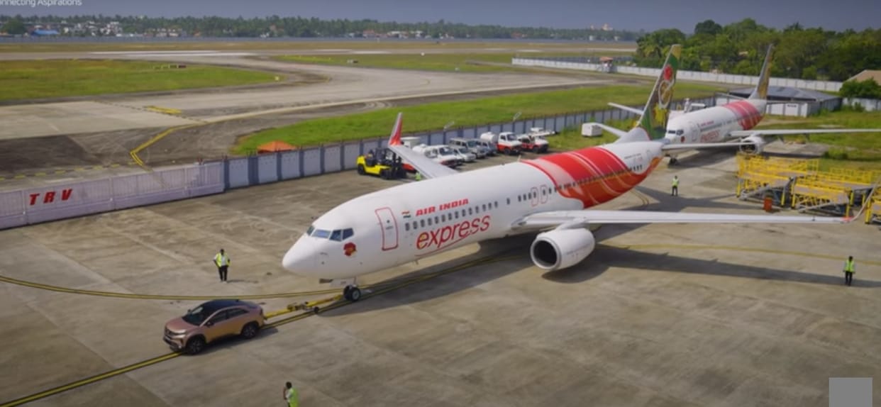 This Car enters India Book of Records for Passenger aircraft pulled by petrol SUV for longest distance