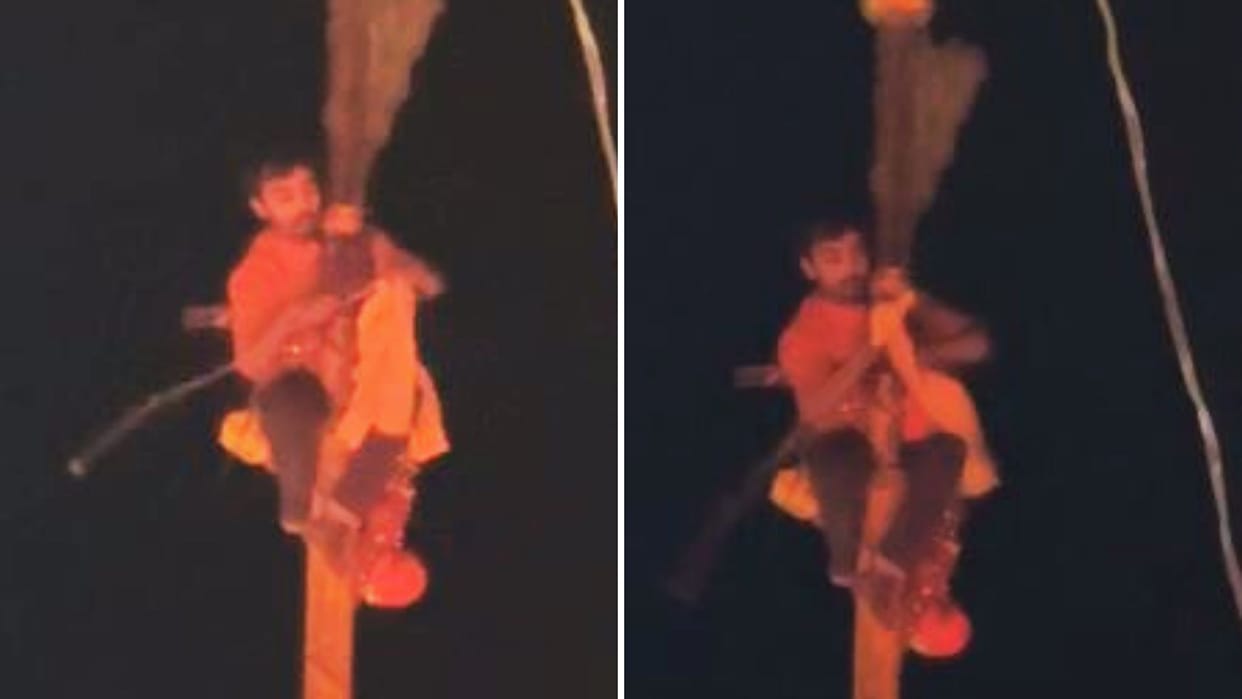 young man climbed on flag of Vindhyavasini temple taken down after effort and escaped