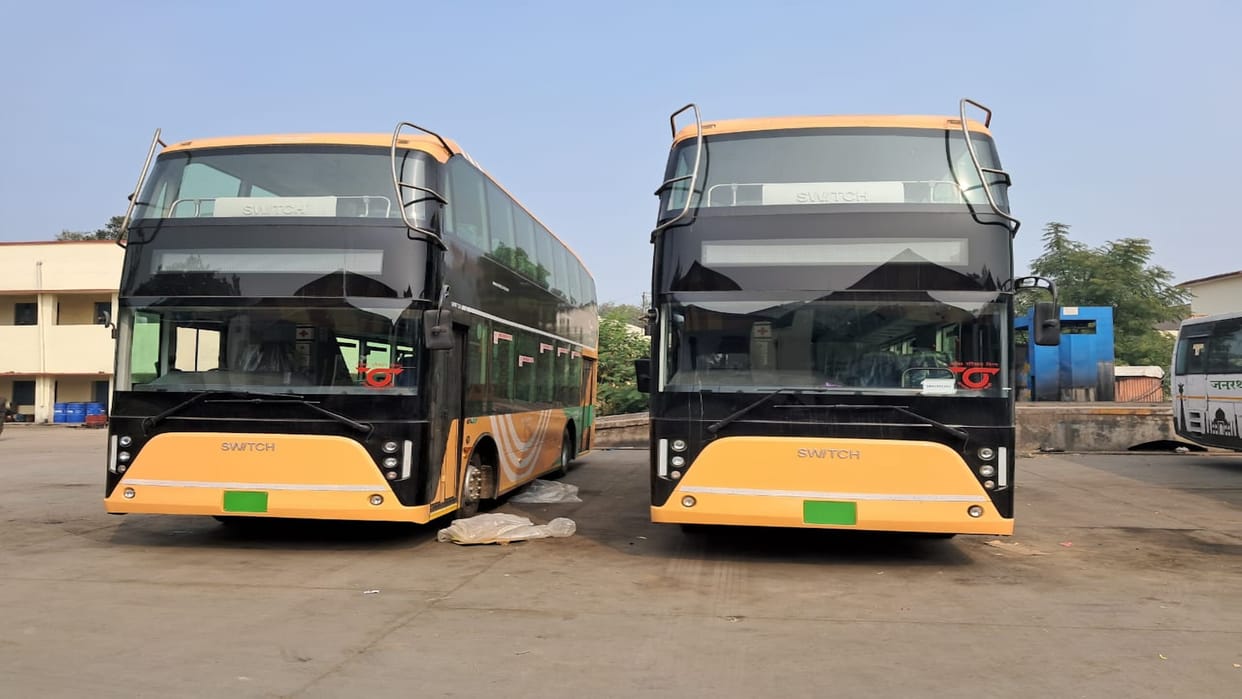 Wires above and underpass below... double decker buses are looking for a way