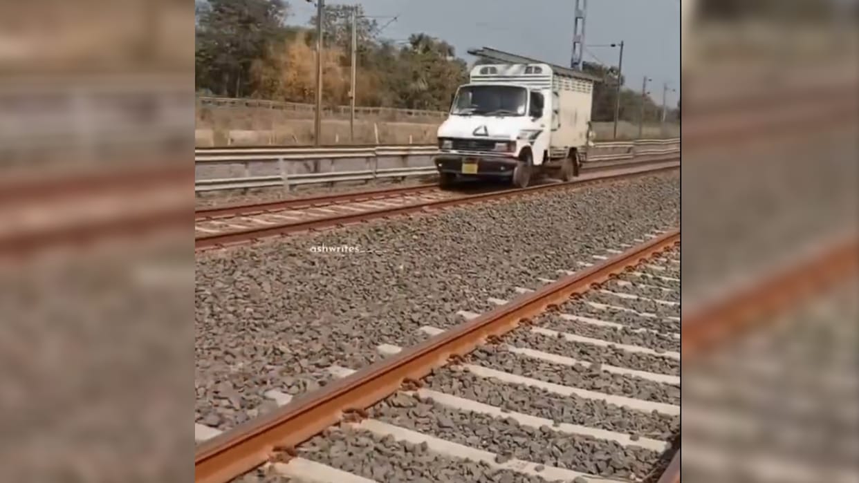 Viral Video Loading van ran on railway track people Says Last option to go to Mahakumbh