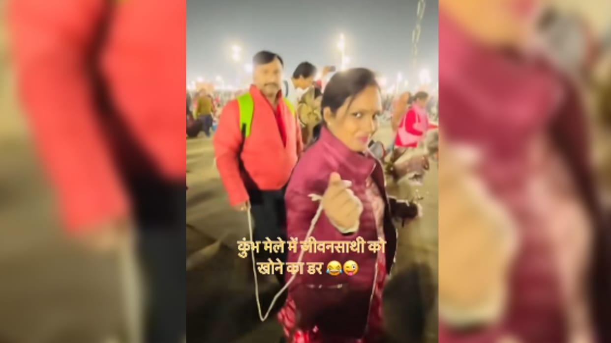 MahaKumbh Viral Video Couple Uses Rope To Stay Together During Crowded Mahakumbh Mela 2025 Indian Jugaad Video