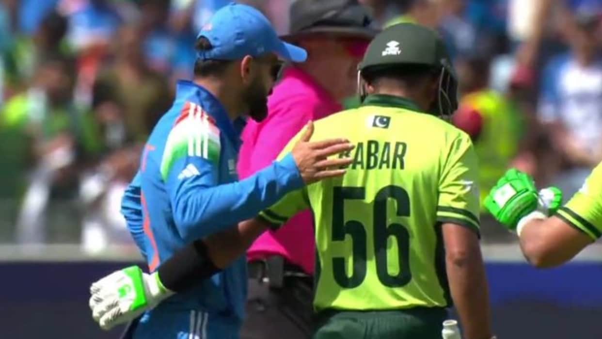 Virat Kohli and Babar Azam met each other during the IND-PAK match MS Dhoni was seen watching the match
