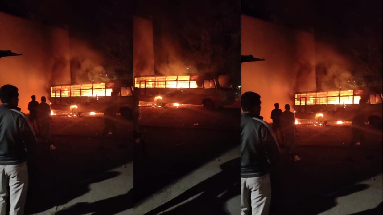 A school bus parked on the roadside caught fire In Bhopal