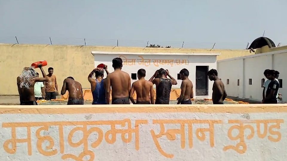 prisoners in jail were made to take a collective bath in Ganges in Raigarh