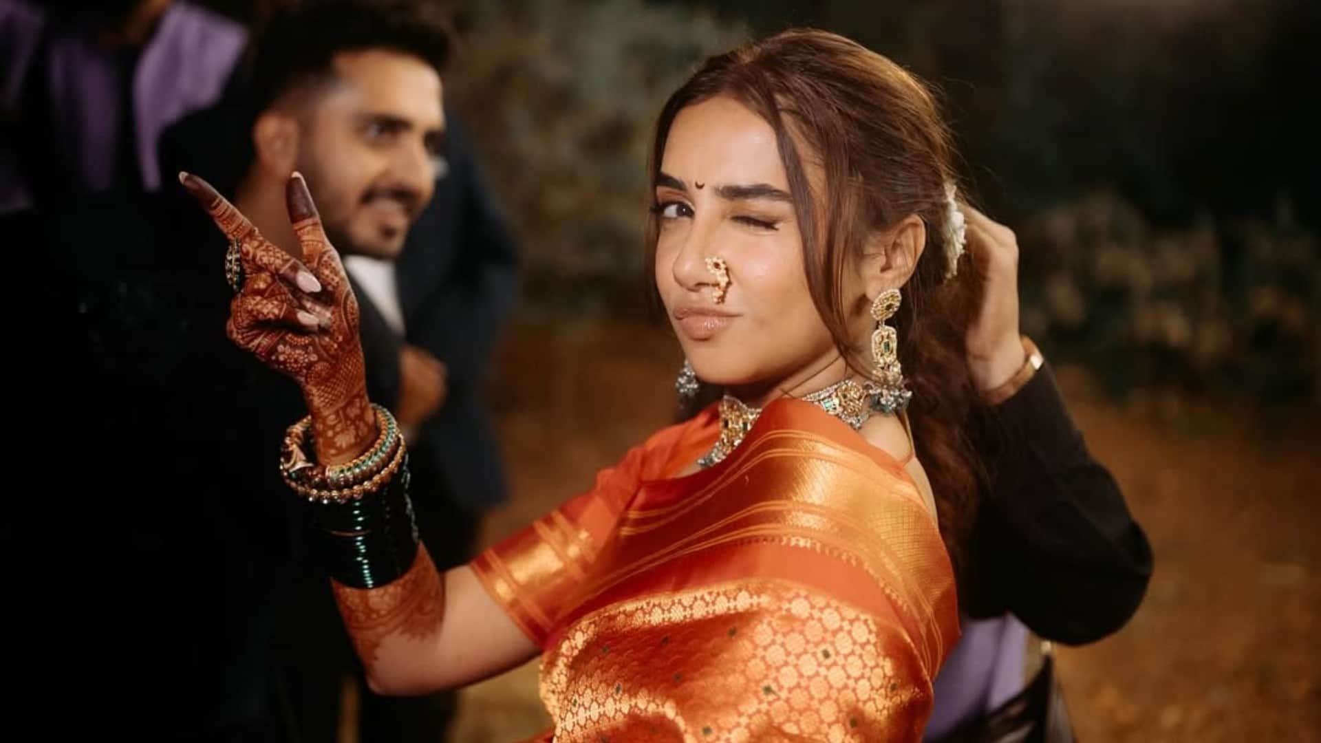 Prajakta Koli dance wearing Maharashtrian nose ring green bangles decorated her hands see photos of sangeet