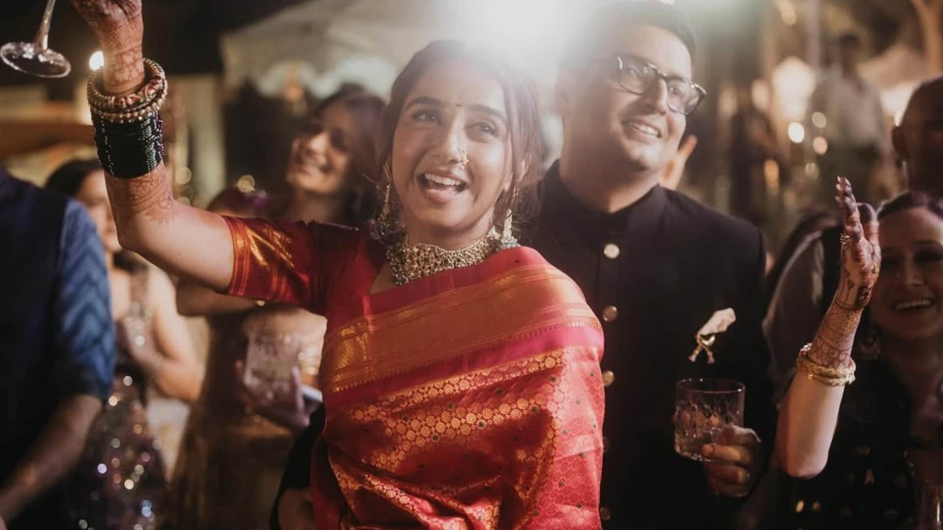 Prajakta Koli dance wearing Maharashtrian nose ring green bangles decorated her hands see photos of sangeet