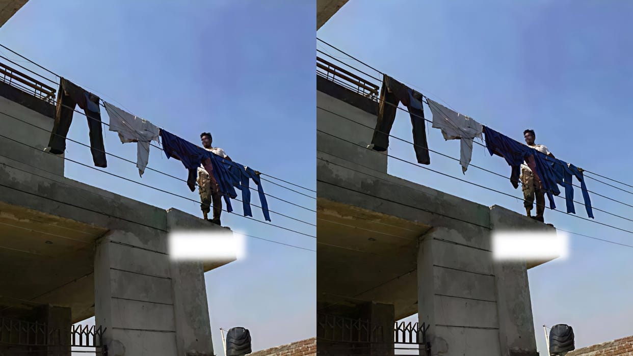 man was drying clothes on a bare electric wire Photo went viral
