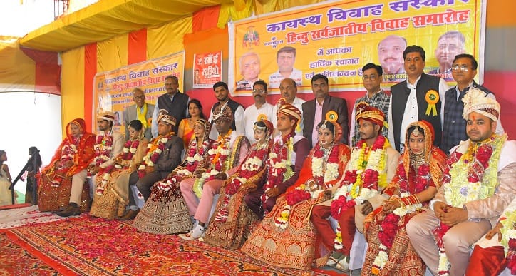 Hindu inter caste marriage ceremony organized seven couples took seven vows they were honored