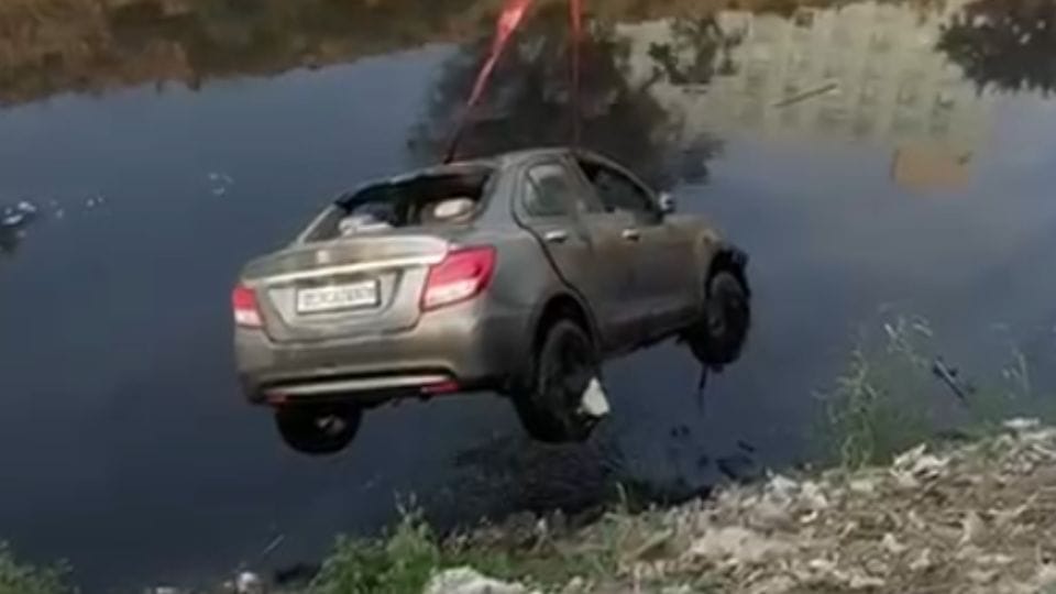 Station master dies after car falls into drain in Greater Noida