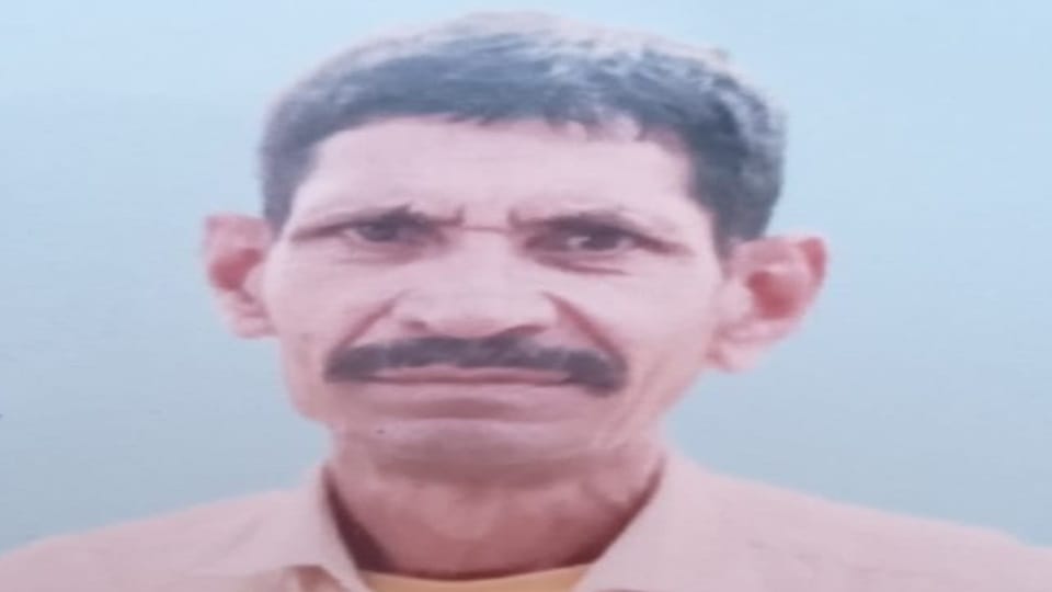 Dead body of a villager found lying on the roadside in Chandaus