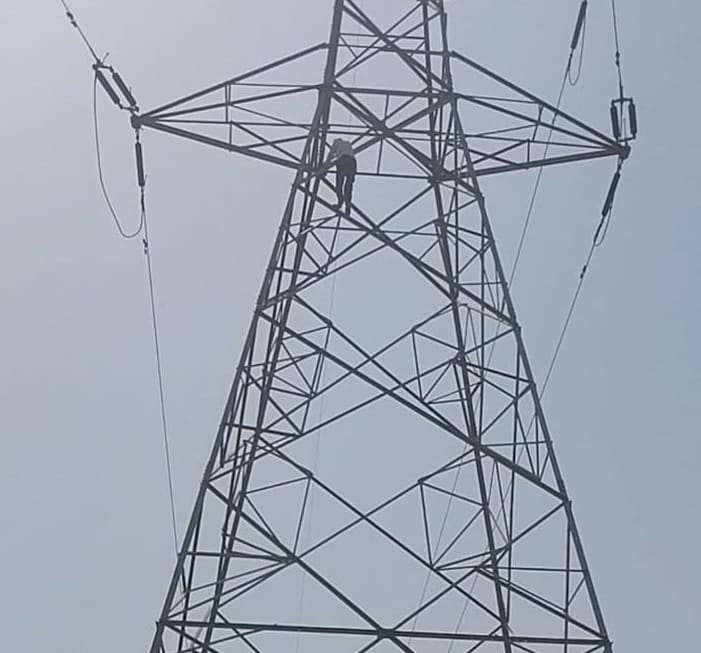 When problem was not solved young man climbed tower