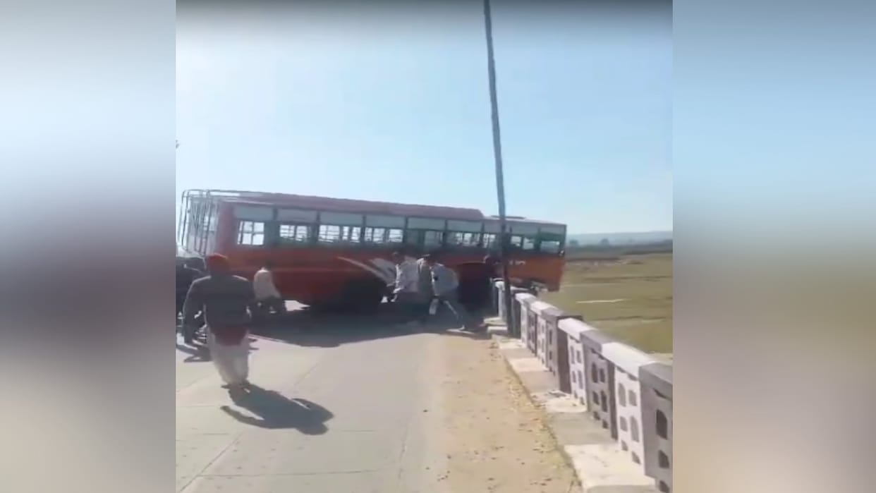 The bus going to Singa collided with the railing of Santoshgarh bridge, got stuck halfway in the air, passenge