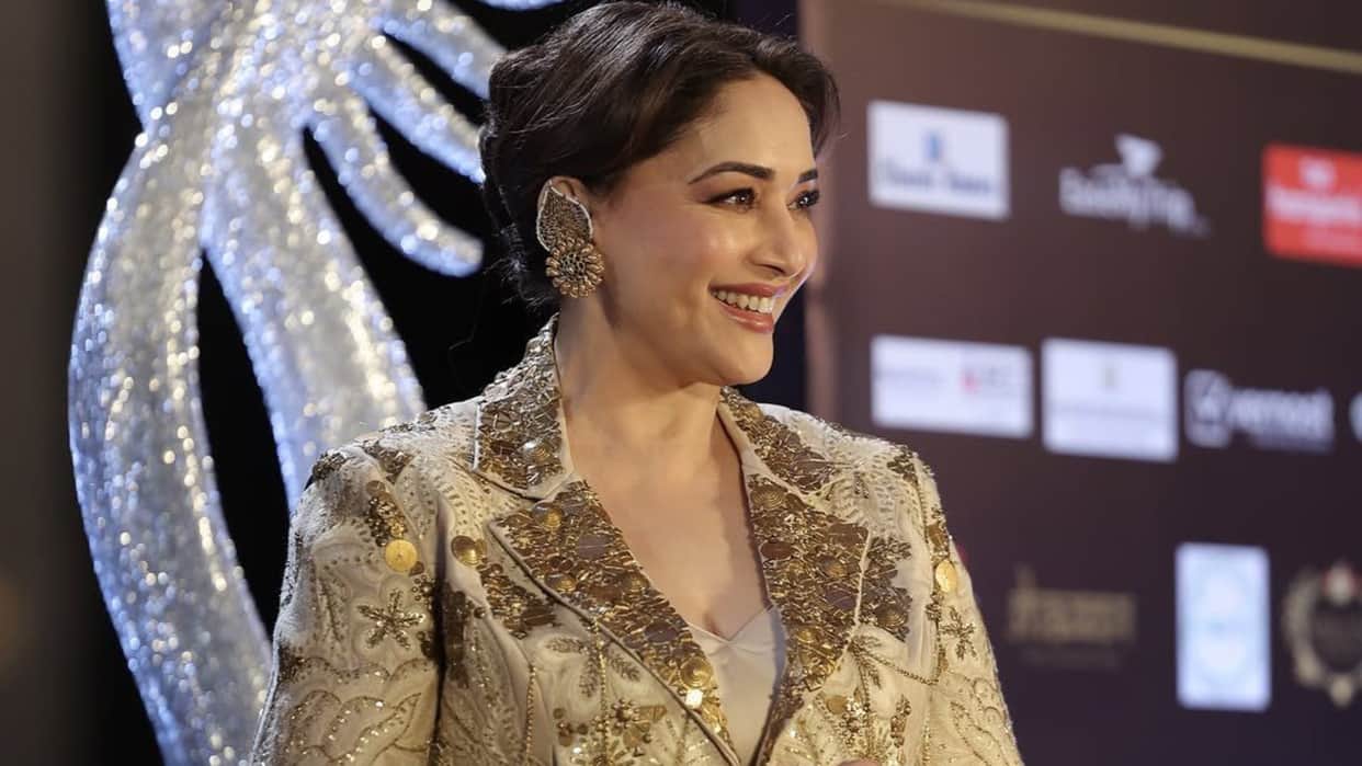 Madhuri Dixit at 25th IIFA Awards event with oscar winning Producer guneet monga