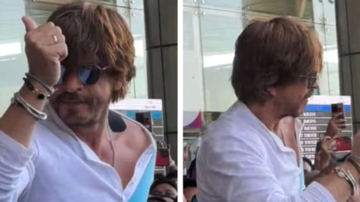 Shah Rukh Khan reached jaipur airport for IIFA give flying kiss to fans