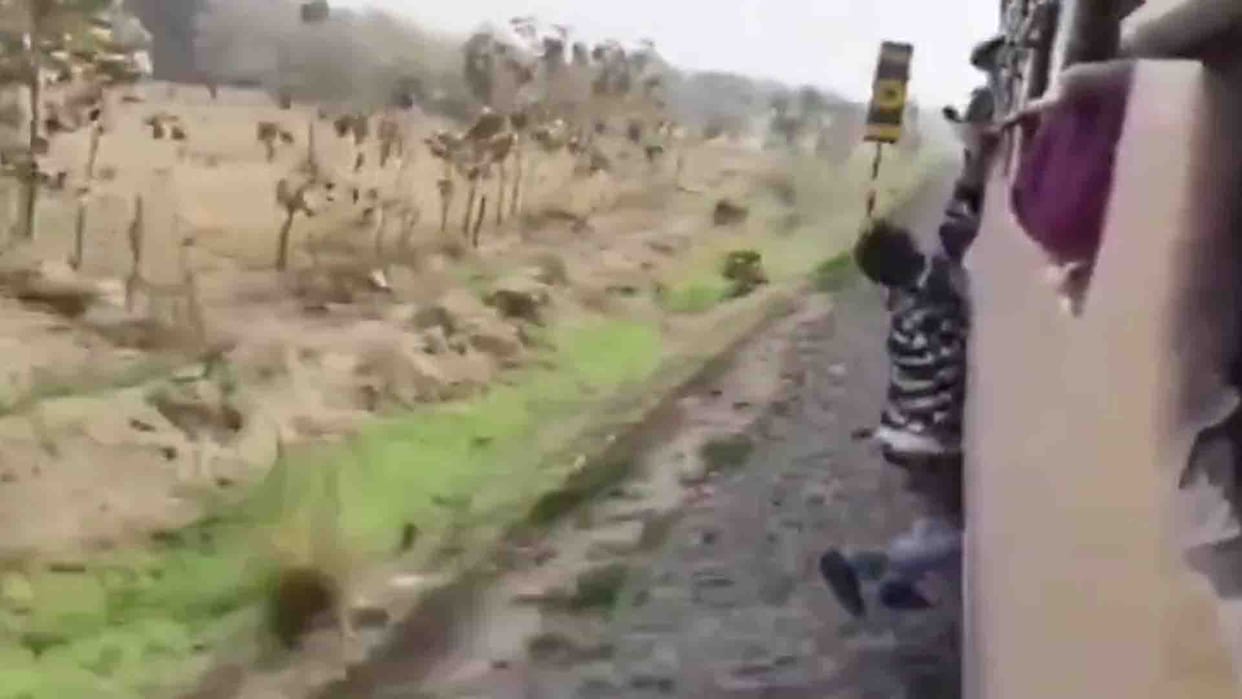 Farrukhabad: Video of a young man doing stunts by hanging from window of moving train goes viral