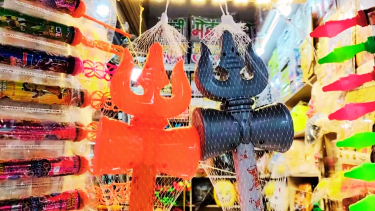 unique Holi Markets decorated with trident damru Om shaped pichkari demand for mask of PM Modi