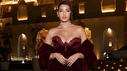 Nora Fatehi Shares photos in red off shoulder gown video goes viral
