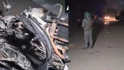 गिरिडीह में झड़प के बाद जले वाहन और इलाके में तैनात पुलिस बल