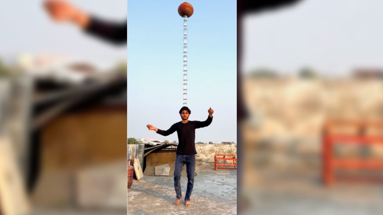 man put a pot on glass full of water then put it on his head dangerous stunt watch viral video