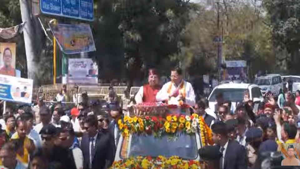 Uttarakhand government Three years CM Dhami grand roadshow, welcomed with a shower of flowers