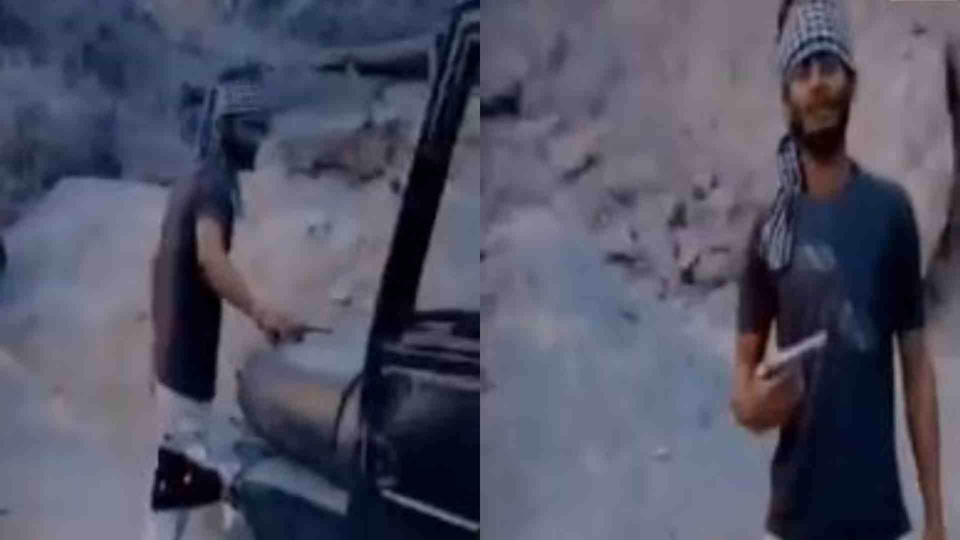 अवैध हथियार लिए पुलिस गाड़ी के साथ वीडियो बनाता बदमाश।