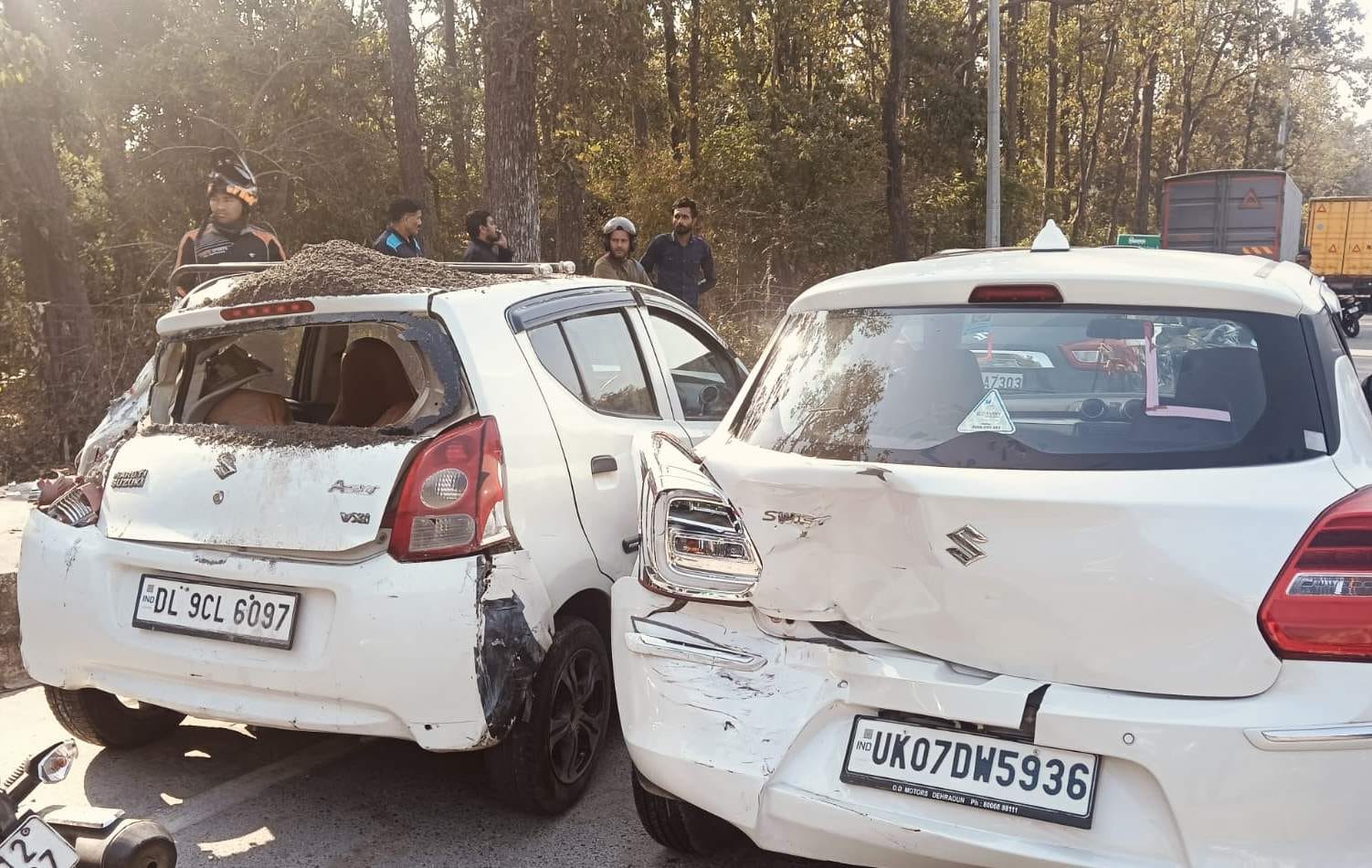 Dehradun Lachhiwala Toll Plaza Accident mining dumper crushed Car dead bodies recovered by cutter Photos