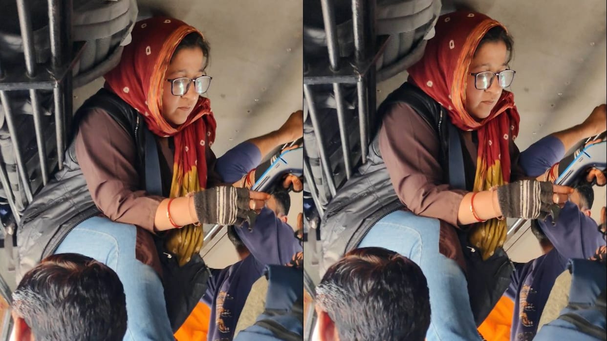 Amidst heavy crowd in the bus woman conductor climbed on the seat and issued tickets video goes viral