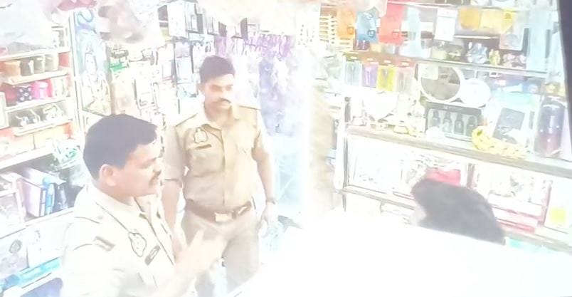 sub inspector who went to serve notice to shopkeeper beat him