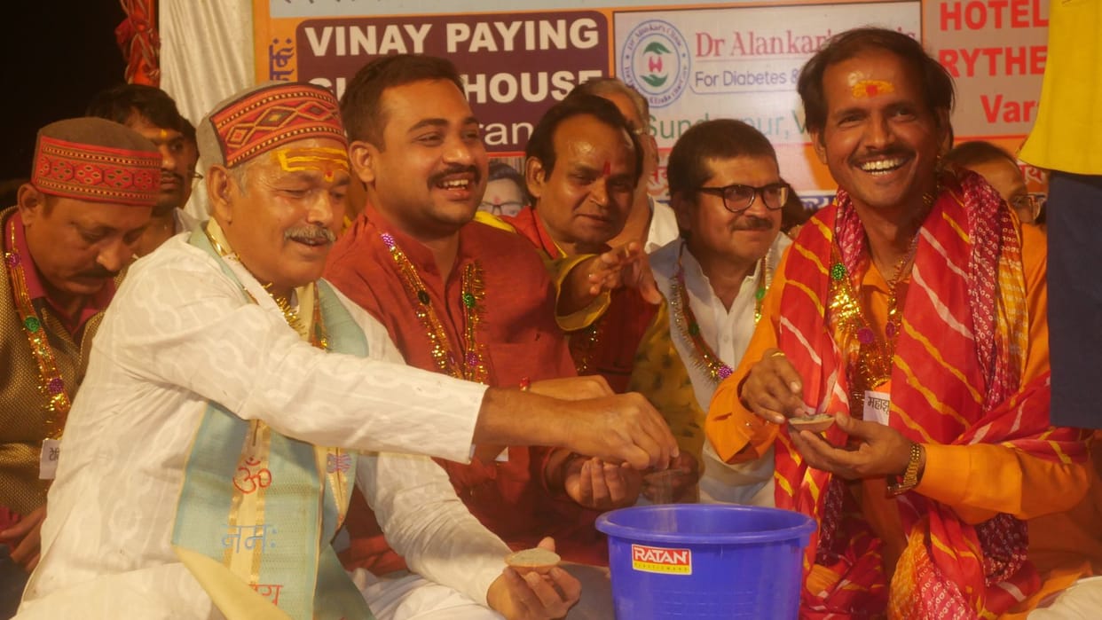Havan with sand and cement in blue drum laughter dhurandhar hasya mahotsava in varanasi