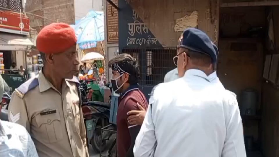 man slapped a home guard for stopping his bike without a helmet