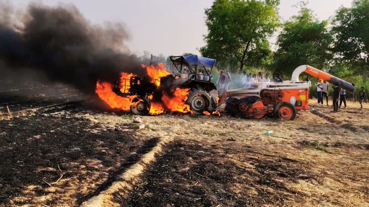 Tractor engine explodes field in ballia 54 bigha crop reduced to ashes 6 sheds and goods destroyed