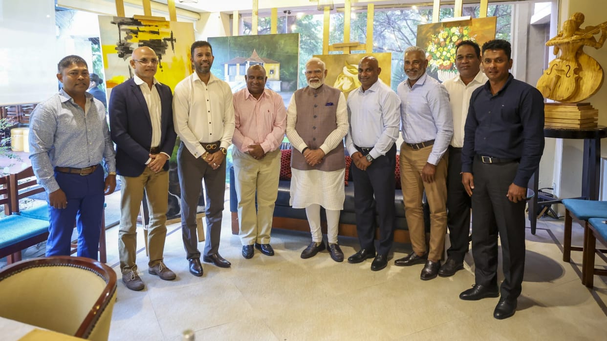 Prime Minister Narendra Modi interacts with Sri Lankan cricketers in Colombo during his visit