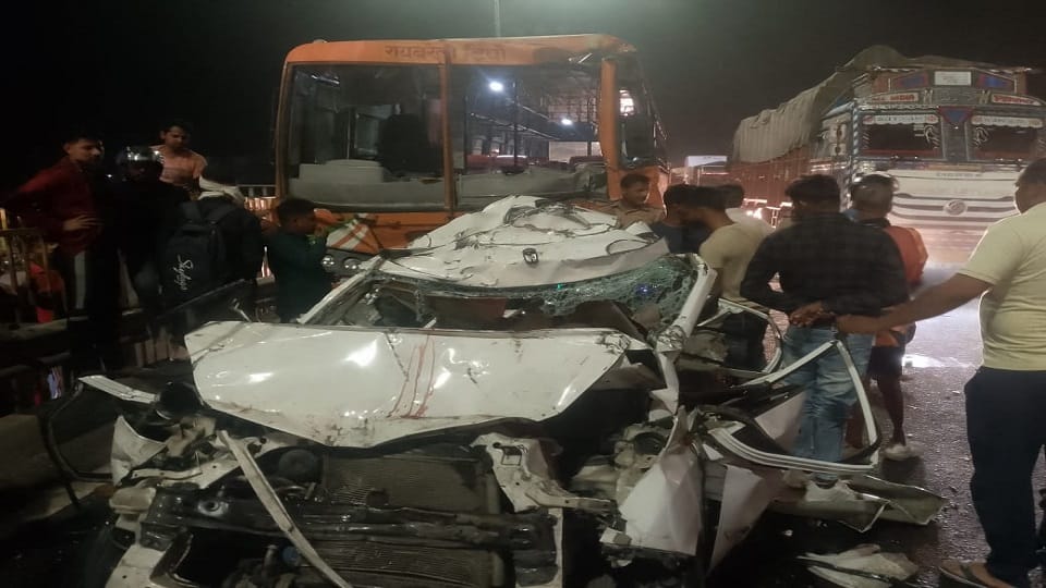Car got crushed between Metador and Roadways two youths got crushed picture of death heart will tremble