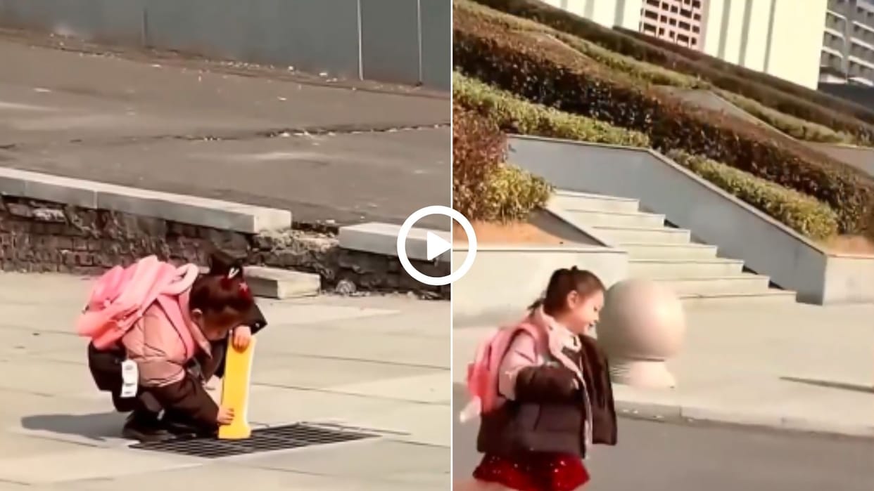 girl with her bag on her back threw her book in the drain, then started dancing happily video went viral