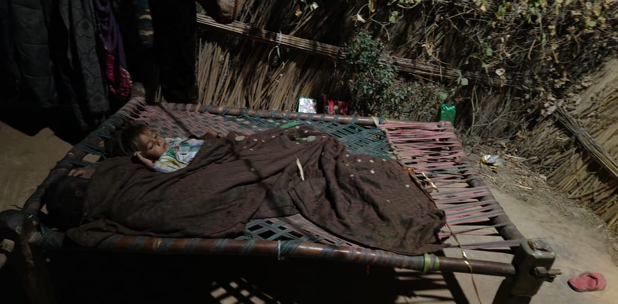 An innocent child lying on a cot was scratched to death by dogs there were big wounds on his chest and back