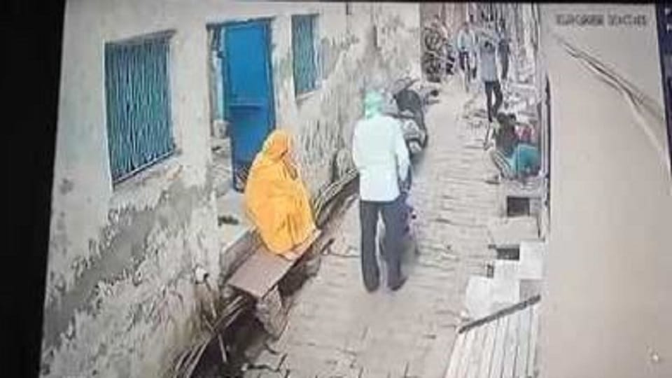 man killed a street dog by beating it with a stick