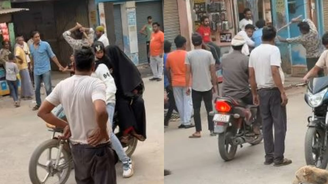 BJP leader surrounded the youth and beat him with a stick in Budaun