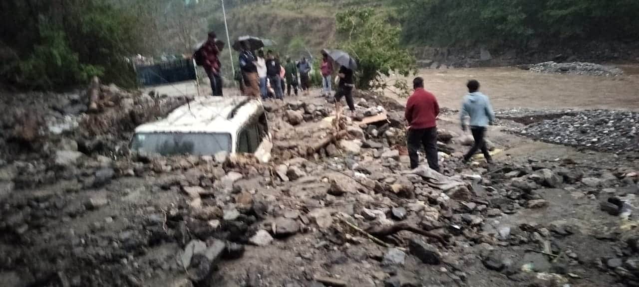 Uttarakhand Weather Heavy Rainfall wreaks havoc in Tharali river in spate many vehicles buried under debris