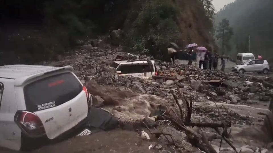 Uttarakhand Weather Heavy Rainfall wreaks havoc in Tharali river in spate many vehicles buried under debris