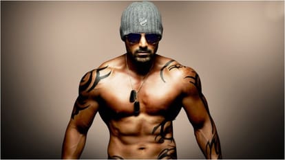 John Abraham gives flowers to airport lady video goes viral Fans Call Him Gentleman