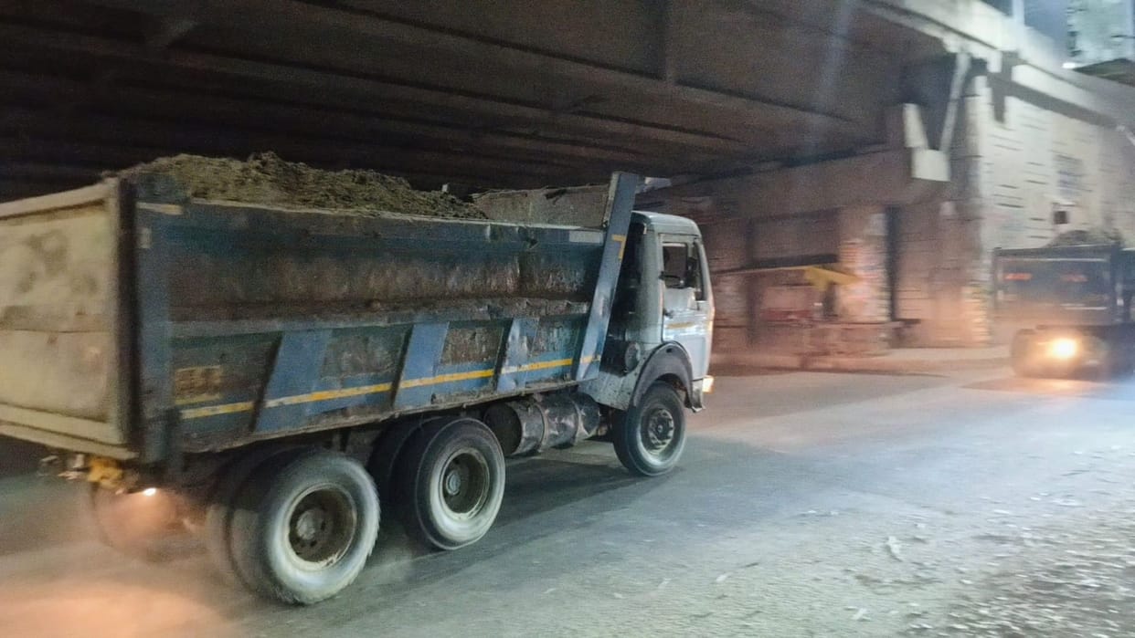 Terror of soil laden dumper on underpass